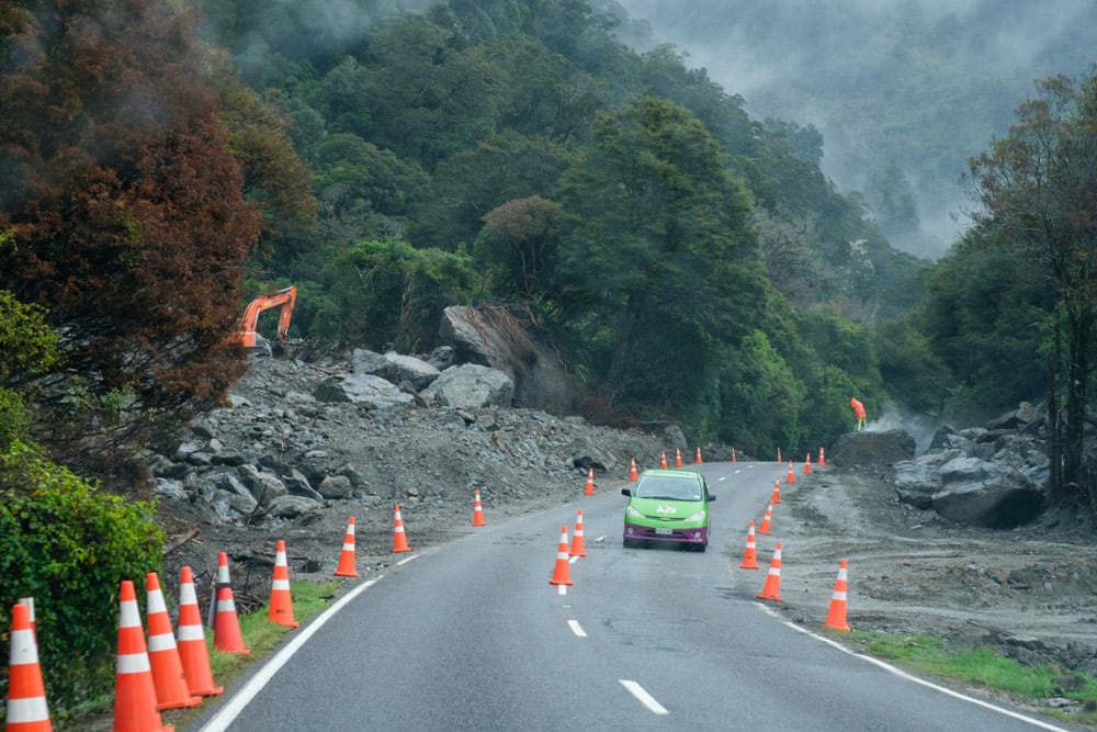 When they have rock fall signs in NZ they really mean it. They were clearing this as we drove through it!
